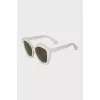 Sunglasses with white shaped frames