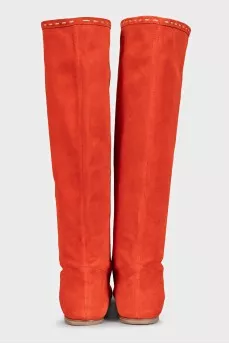 Orange suede slip-on boots