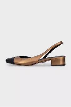 Gold slingbacks with contrast toe