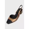 Gold slingbacks with contrast toe