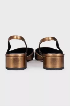 Gold slingbacks with contrast toe