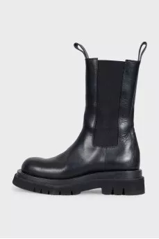 Black leather high boots