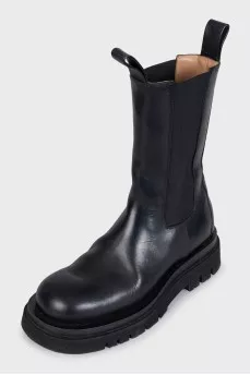 Black leather high boots