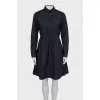 Black dress with decorative perforations