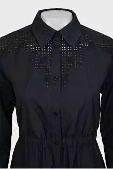 Black dress with decorative perforations