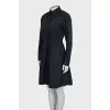 Black dress with decorative perforations