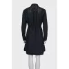 Black dress with decorative perforations