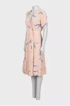 Beige dress with a cutout