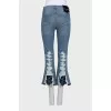 Flared jeans with a ripped effect