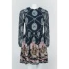 Blue dress with lightning drawings