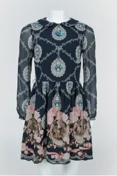 Blue dress with lightning drawings