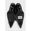 Black leather pumps with decoration