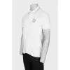 Men's white polo shirt with branded patch
