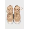 High-top leather sneakers with zippers