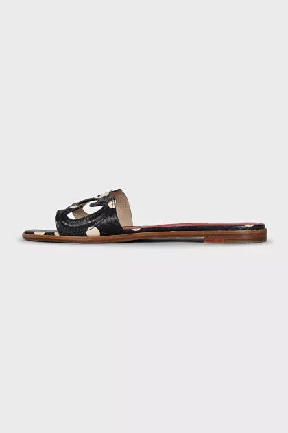 Black animal print flip flops