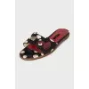 Black animal print flip flops