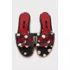 Black animal print flip flops