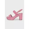 Pink suede sandals with a stable heel