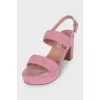 Pink suede sandals with a stable heel