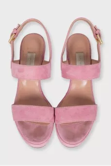 Pink suede sandals with a stable heel