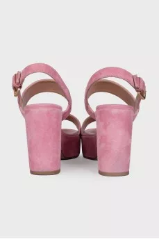 Pink suede sandals with a stable heel