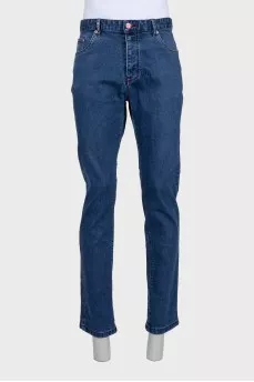 Men's blue jeans with a red stripe