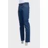 Men's blue jeans with a red stripe