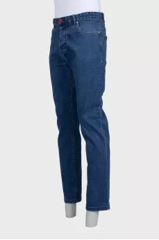 Men's blue jeans with a red stripe