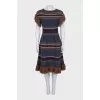 Cashmere dress decorated with fringe