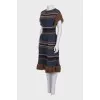 Cashmere dress decorated with fringe