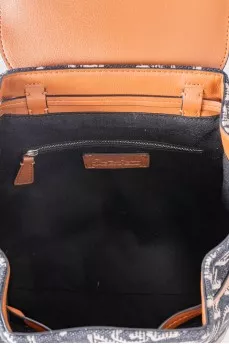 A combination backpack with a signature print