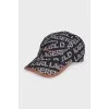 Black cap with a signature monogram