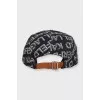 Black cap with a signature monogram
