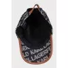 Black cap with a signature monogram