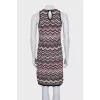 Straight dress with a printed button