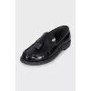 Leather loafers with front decoration