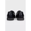 Leather loafers with front decoration