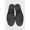 Leather loafers with front decoration