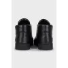 Men's black leather boots with logo