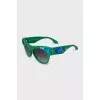 Sunglasses decorated with blue crystals