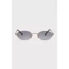 Oval shaped sunglasses in gold color
