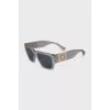 Sunglasses decorated with the company logo