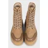 Brown textile lace-up boots