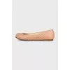 Pink leather ballet flats with signature weave