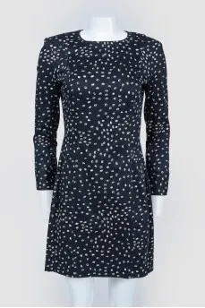 Black dress with white polka dots with a zipper