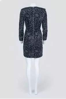 Black dress with white polka dots with a zipper