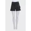 Denim shorts with button slits