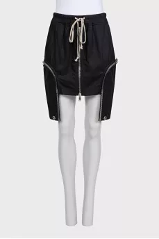 Mini skirt with decorative pockets and ties