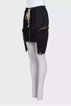 Mini skirt with decorative pockets and ties