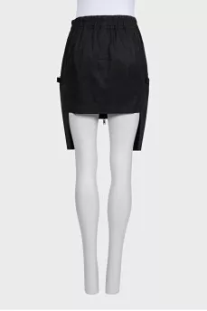 Mini skirt with decorative pockets and ties